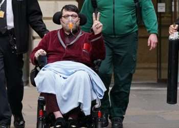 Nicholas Rossi arrested on suspicion of historical rape in England as fugitive is quizzed by Essex cops