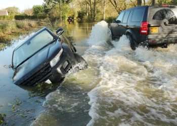 UK weather: Rain eases TODAY but 42 flood warnings are still in place as Brits battle burst banks