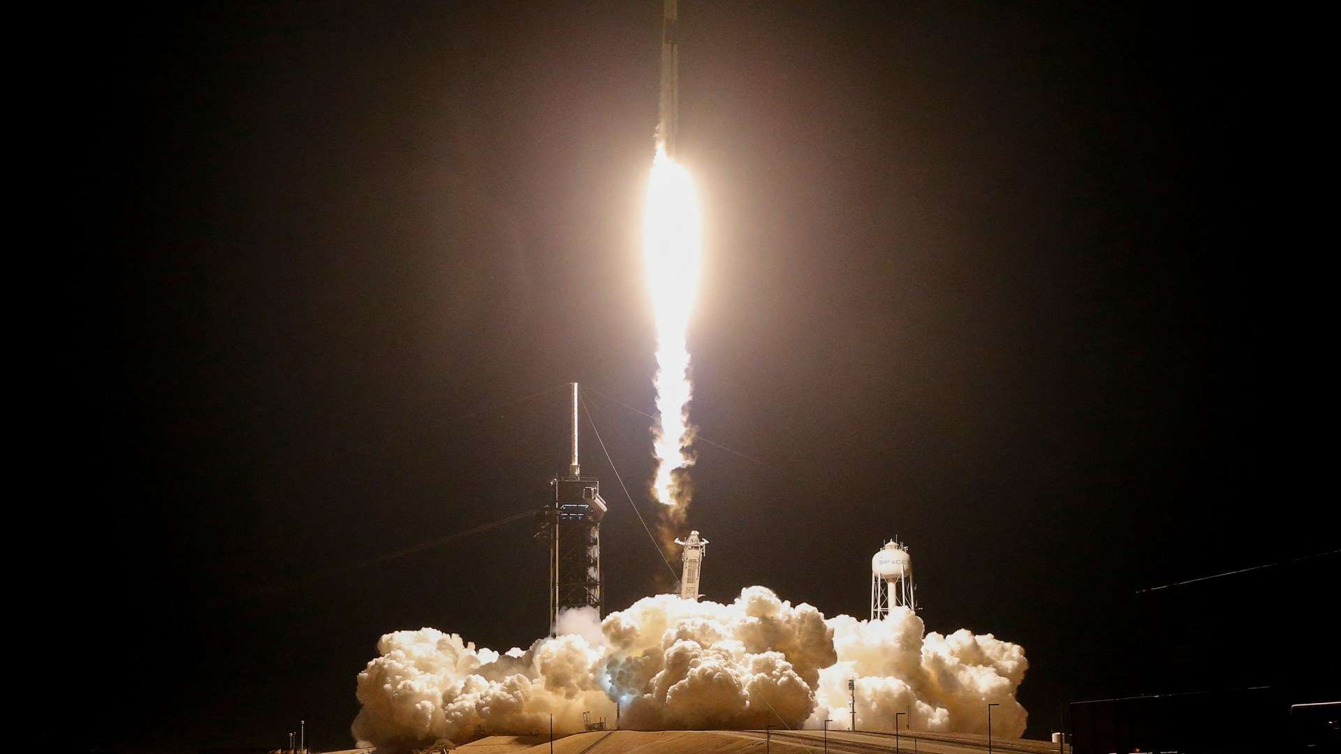 Nasa astronauts blast off on SpaceX rocket to ISS with a Russian crew member as they start new six month mission