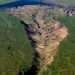 'Gate to Hell' crater that is a 'portal to 200,000-year-old ancient world' & belches prehistoric gas is getting BIGGER