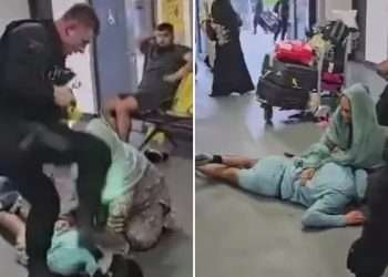 Teenager was kicked in face by cop at airport after ‘man rammed his mum with luggage trolley following mid-air row’