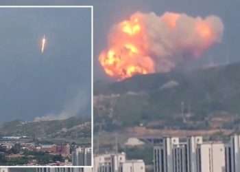 Watch giant explosion as Chinese rocket crashes into mountain after 'accidental' launch during tests