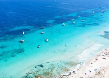 ‘Like the Caribbean’: Ibiza’s quiet little sister with lunar beaches and turquoise oceans 