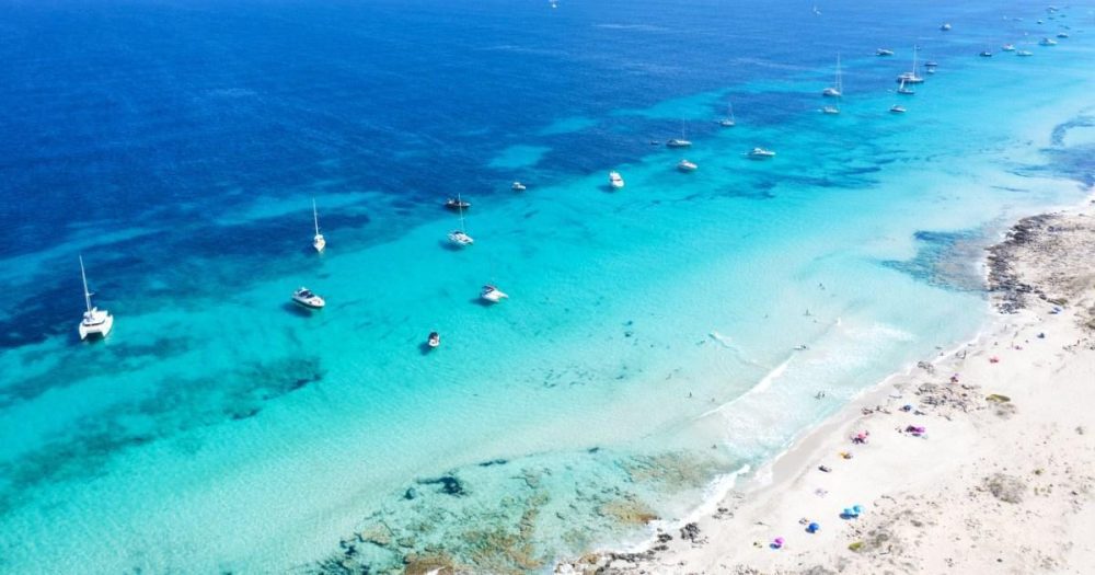 ‘Like the Caribbean’: Ibiza’s quiet little sister with lunar beaches and turquoise oceans 
