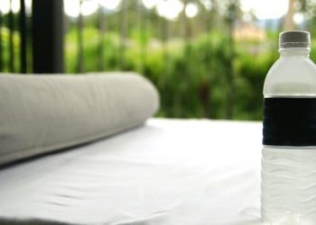 Why you should always throw a water bottle under your hotel bed
